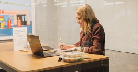 Pioneer employee working at her desk