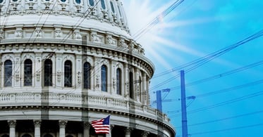 A capitol building overlaid on top of an energy grid.