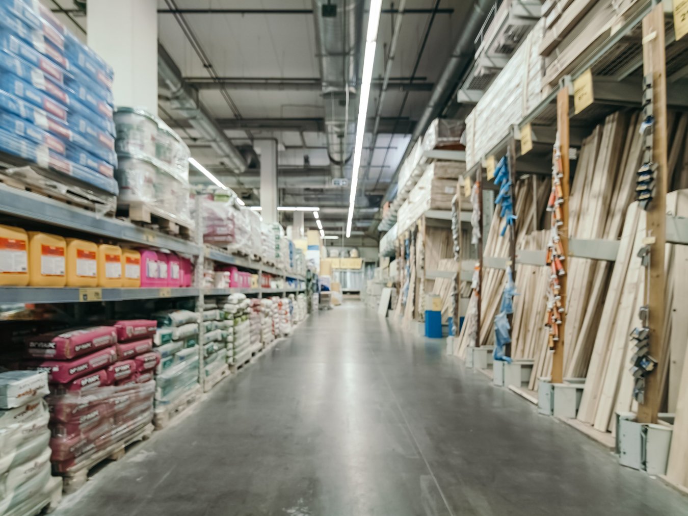 A warehouse aisle with home construction supplies.