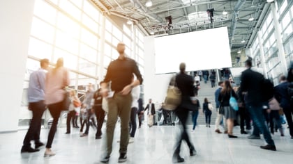 people moving through event space